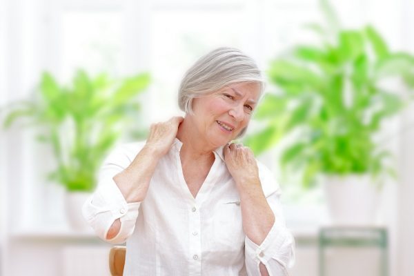 Older Woman with Fibromyalgia Shoulder Muscle Pain